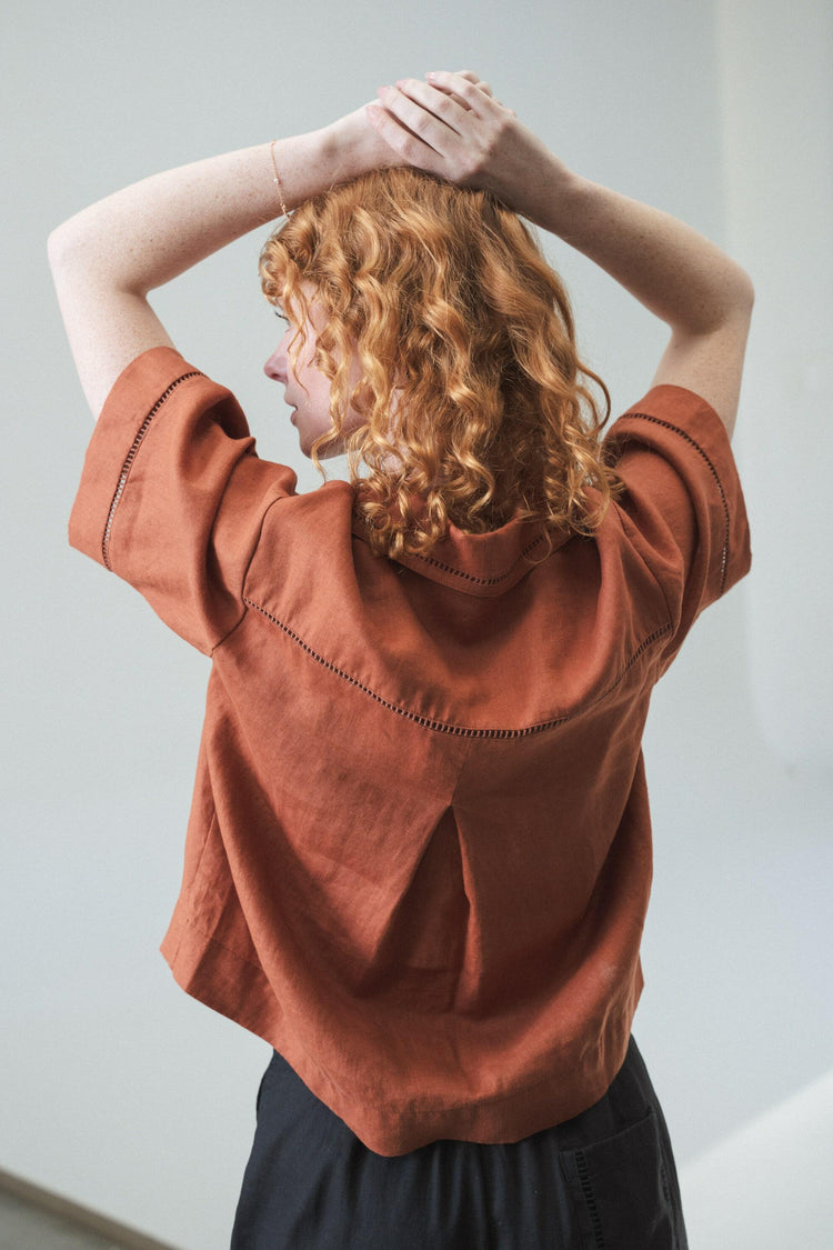 Quinn Linen Shirt in Cajun Red - back close up view paired with black Oli pants - Lilly Pilly Collection