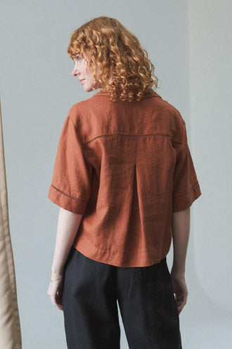 Quinn Linen Shirt in Cajun Red - back view paired with black Rika pants - Lilly Pilly Collection