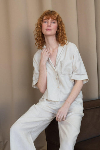 Quinn Linen Shirt in Chalk White - front view while paired with matching Rika pants in a studio setting - Lilly Pilly Collection