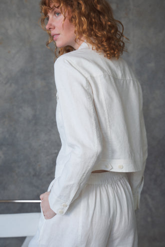 Milly Linen Jacket in Ivory - side view seated paired with Oli ivory pants - Lilly Pilly Collection