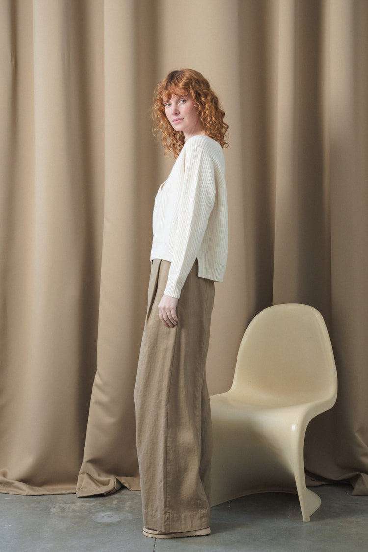 Cora Merino Knit in Ivory - side profile, deep V-neckline, studio setting - Lilly Pilly Collection