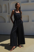 Woman wearing the Keely Linen jumpsuit in Black - Lilly Pilly Collection