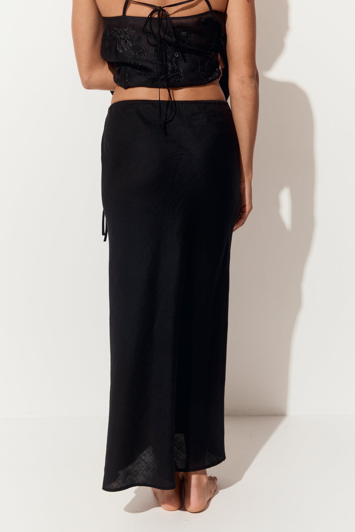 Riley Bias Linen Skirt in Black - close-up back view, seam detail - Lilly Pilly Collection