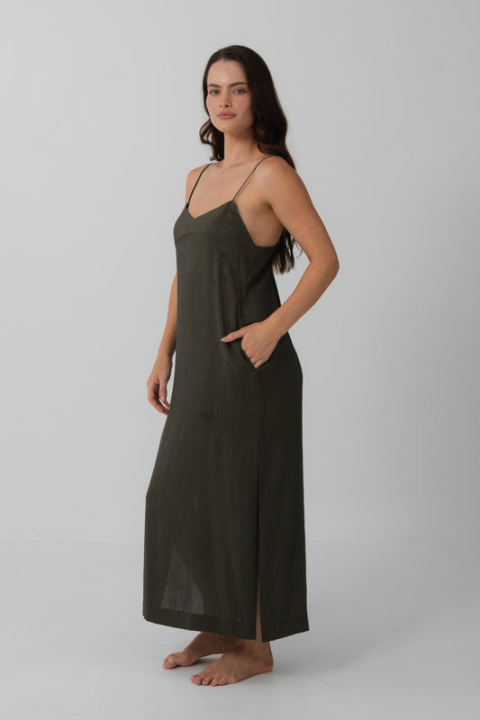 Ally Linen Silk Midi Slip Dress in Khaki - three-quarter view, hand in pocket, V-neckline and side split - Lilly Pilly Collection