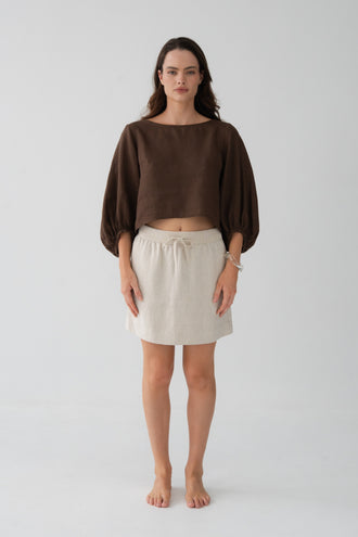 Anelle Linen Mini Skirt in Oatmeal - full length front view, drawstring waistband, worn with Tilly Cotton Voile Shirt in Chocolate - Lilly Pilly Collection