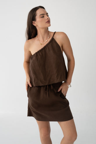 Anelle Linen Mini Skirt in Chocolate - full length, worn with Leni Silk Cami in Chocolate, drawstring waistband, pearl and gold necklace - Lilly Pilly Collection