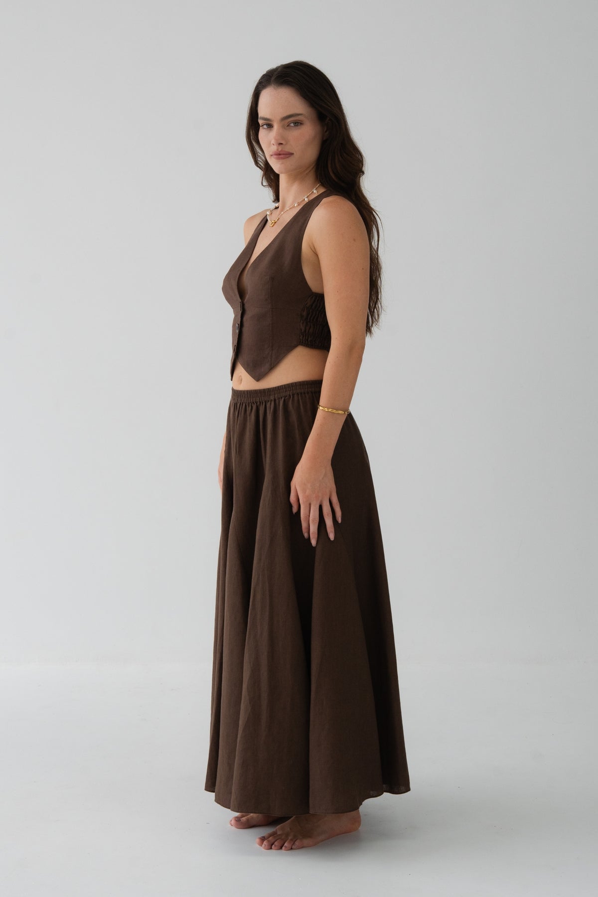 Ari Linen Vest in Chocolate - side profile, cropped pointed hem, styled with matching Riley Linen Skirt - Lilly Pilly Collection