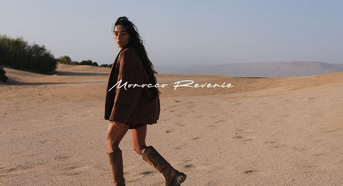 LILLY PILLY woman walking in a desert landscape with 'Morocco Reverie' branding.