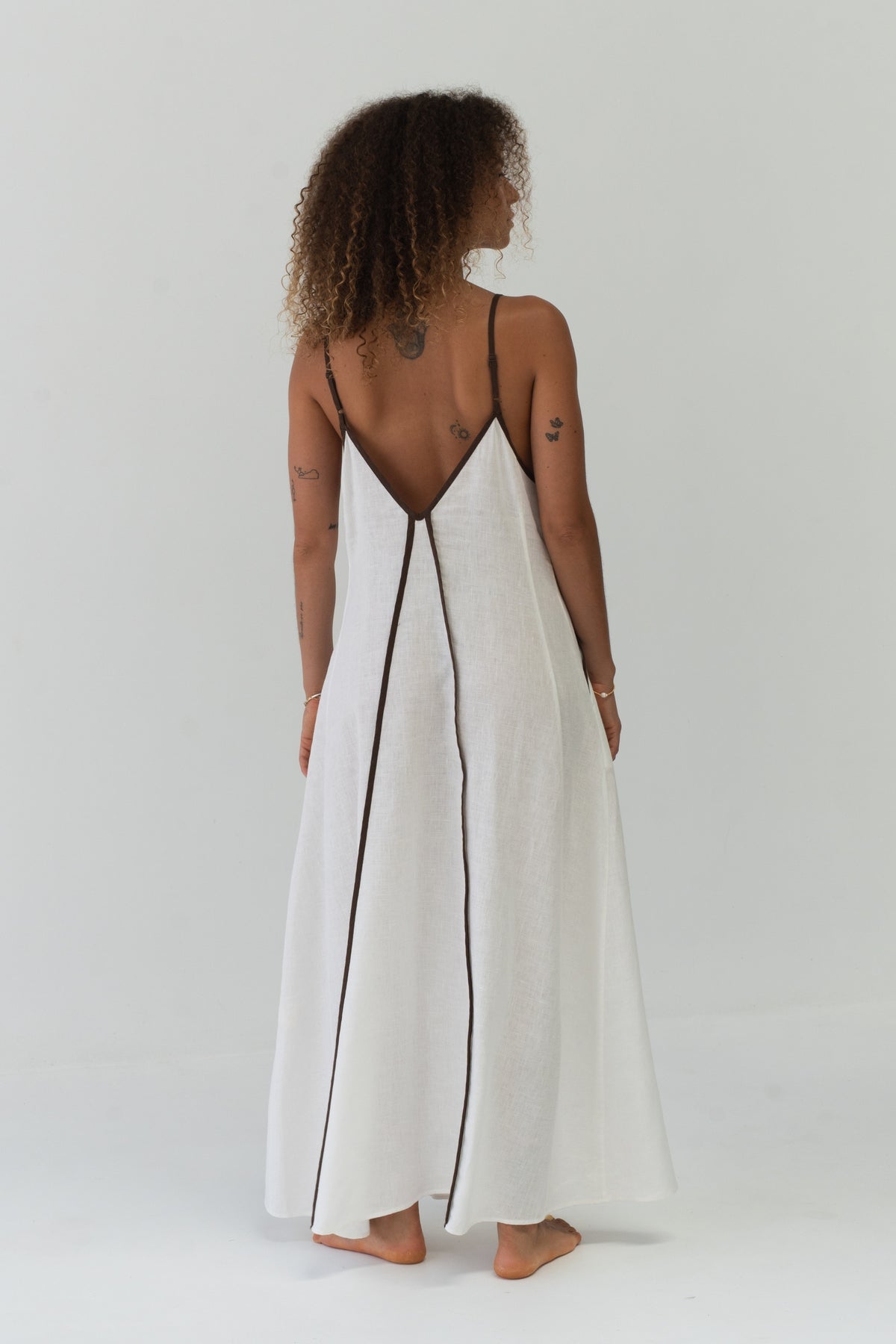 Azalea Linen Maxi Dress in Ivory - back view, open V-back with contrast trim and spaghetti straps - Lilly Pilly Collection