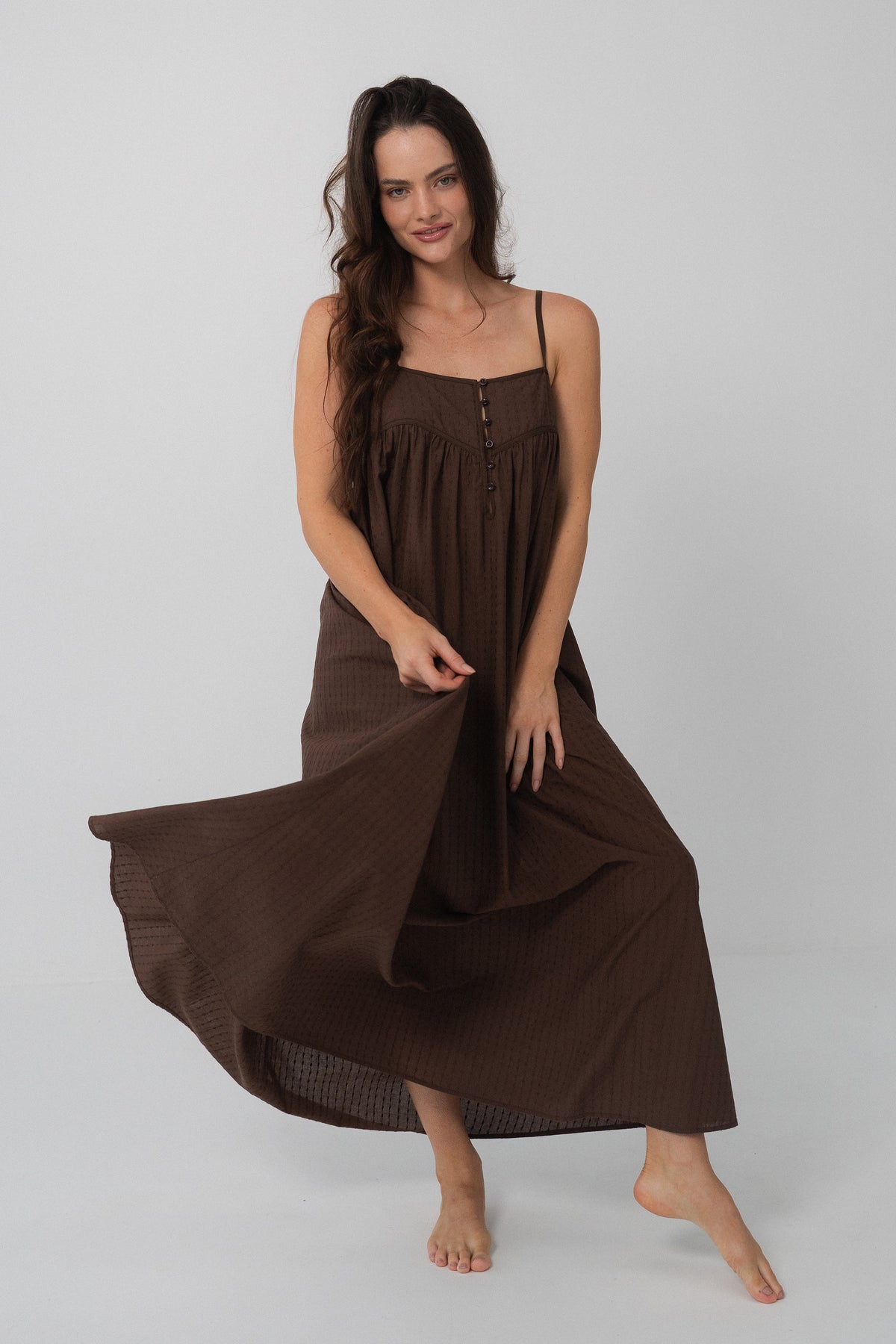 Beatrice Cotton Midi Dress in Chocolate - woman twirling, voluminous midi skirt in motion - Lilly Pilly Collection