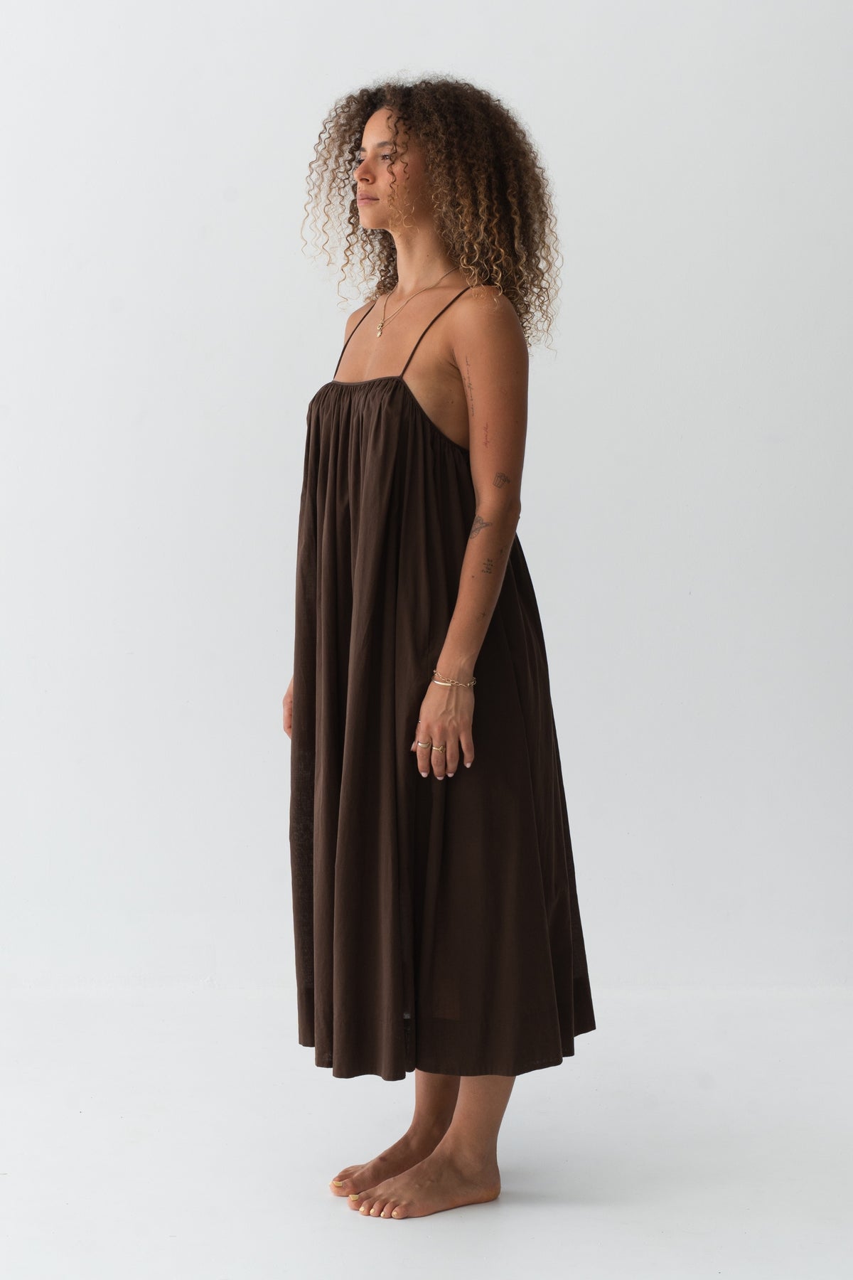 Belle Cotton Midi Dress in Chocolate - side profile, fluid cotton voile drape and midi length - Lilly Pilly Collection