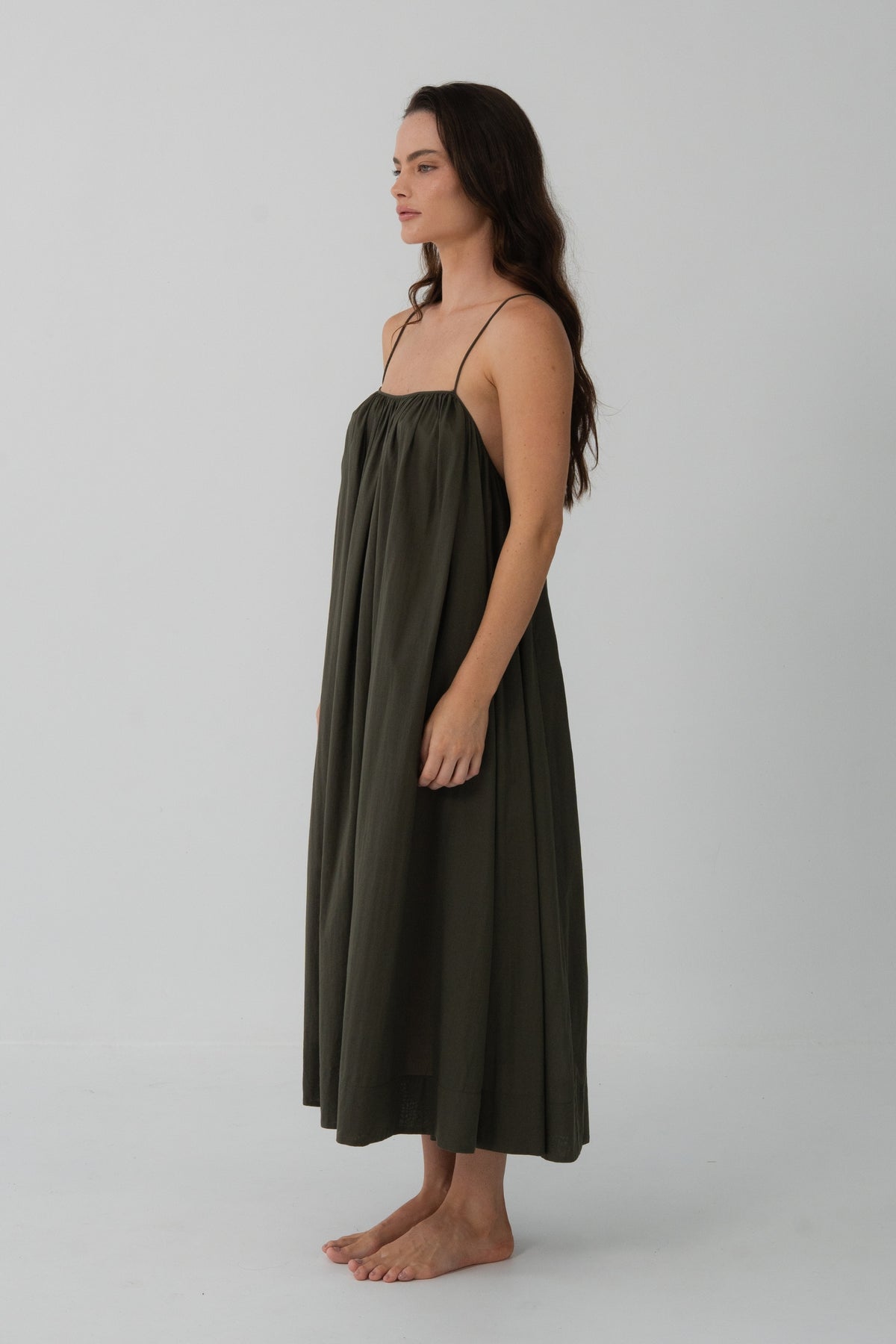 Belle Cotton Midi Dress in Khaki - side profile, fluid cotton voile drape and midi length - Lilly Pilly Collection