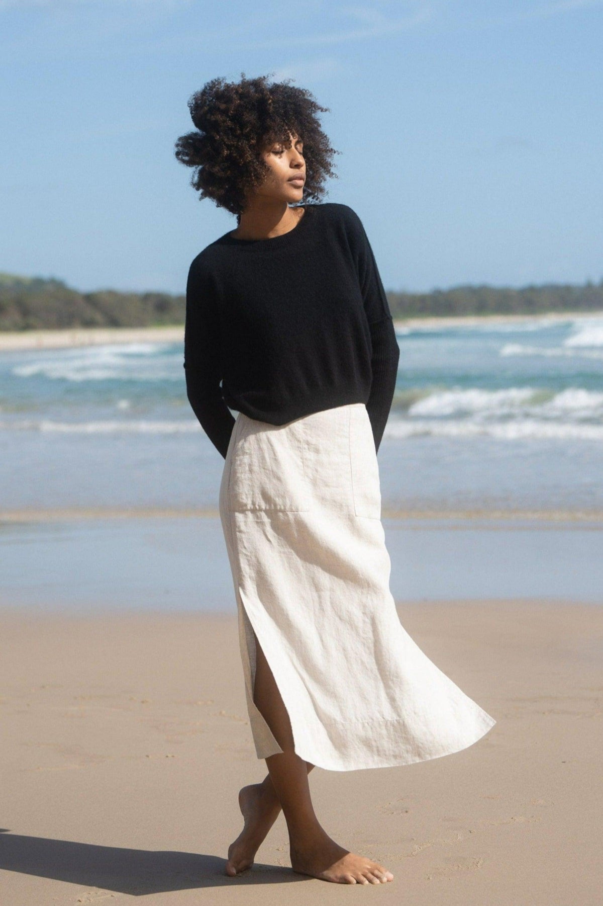 LILLY PILLY Collection Miri Knit made from 95% cashmere and 5% wool in Black on  a beach