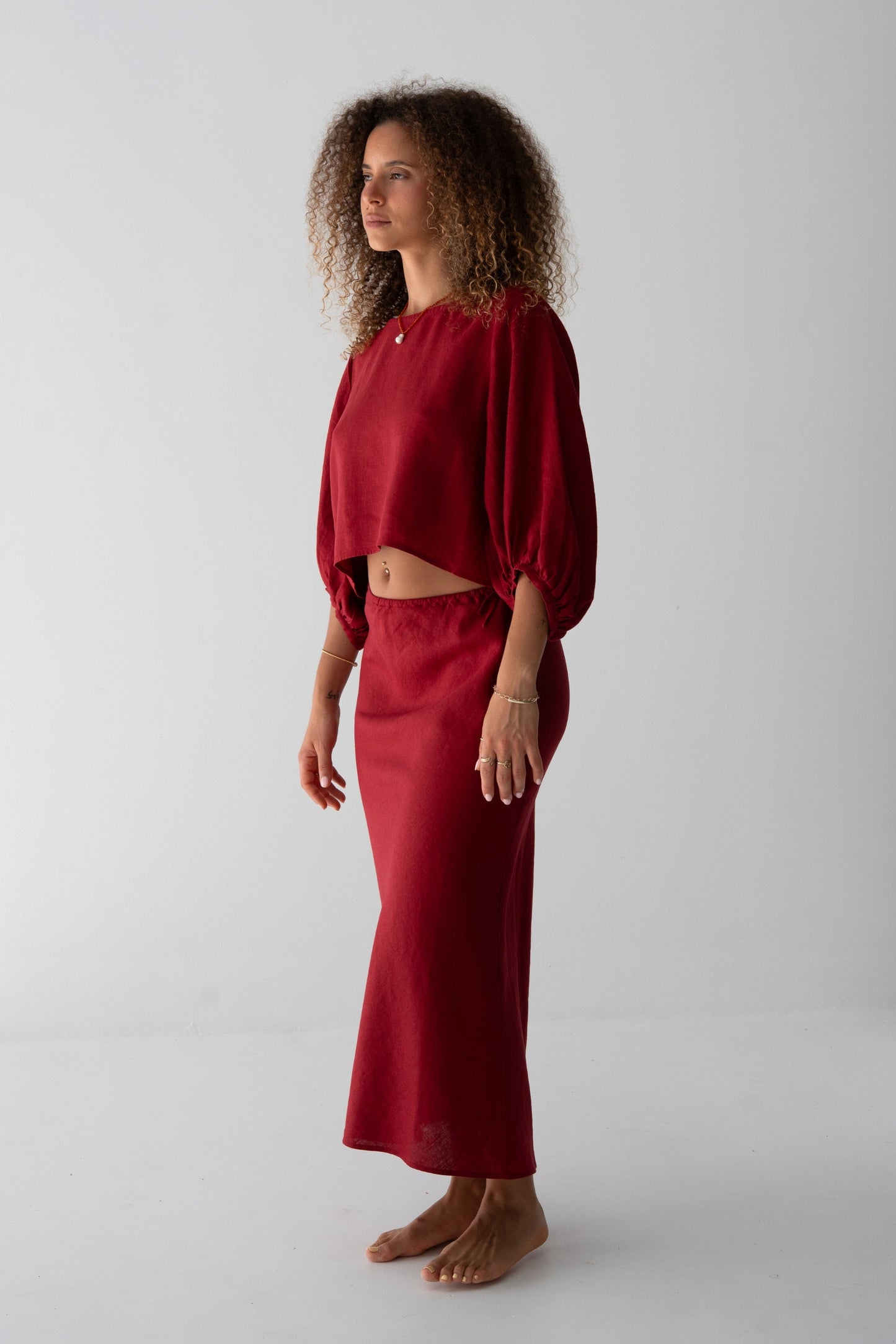 Demi Linen Top in Cherry Red - side profile, puff sleeve and cropped hem, styled with matching Riley Linen Skirt - Lilly Pilly Collection