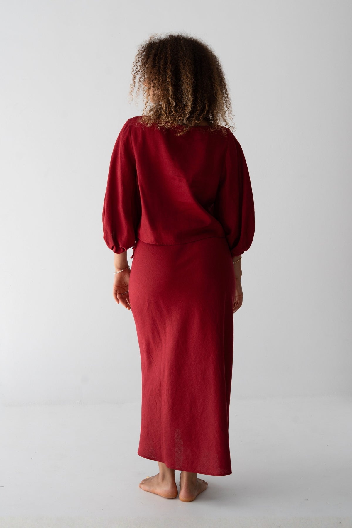 Demi Linen Top in Cherry Red - back view, puff sleeves and cropped silhouette, styled with matching Riley Linen Skirt - Lilly Pilly Collection
