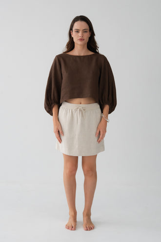 Demi Linen Top in Chocolate - front view, round neckline and puff sleeves with elasticated cuffs, styled with oatmeal linen mini skirt - Lilly Pilly Collection