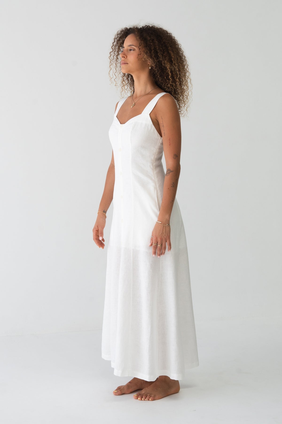 Eden Linen Midi Dress in Ivory - side profile, sweetheart neckline and fluid midi length - Lilly Pilly Collection
