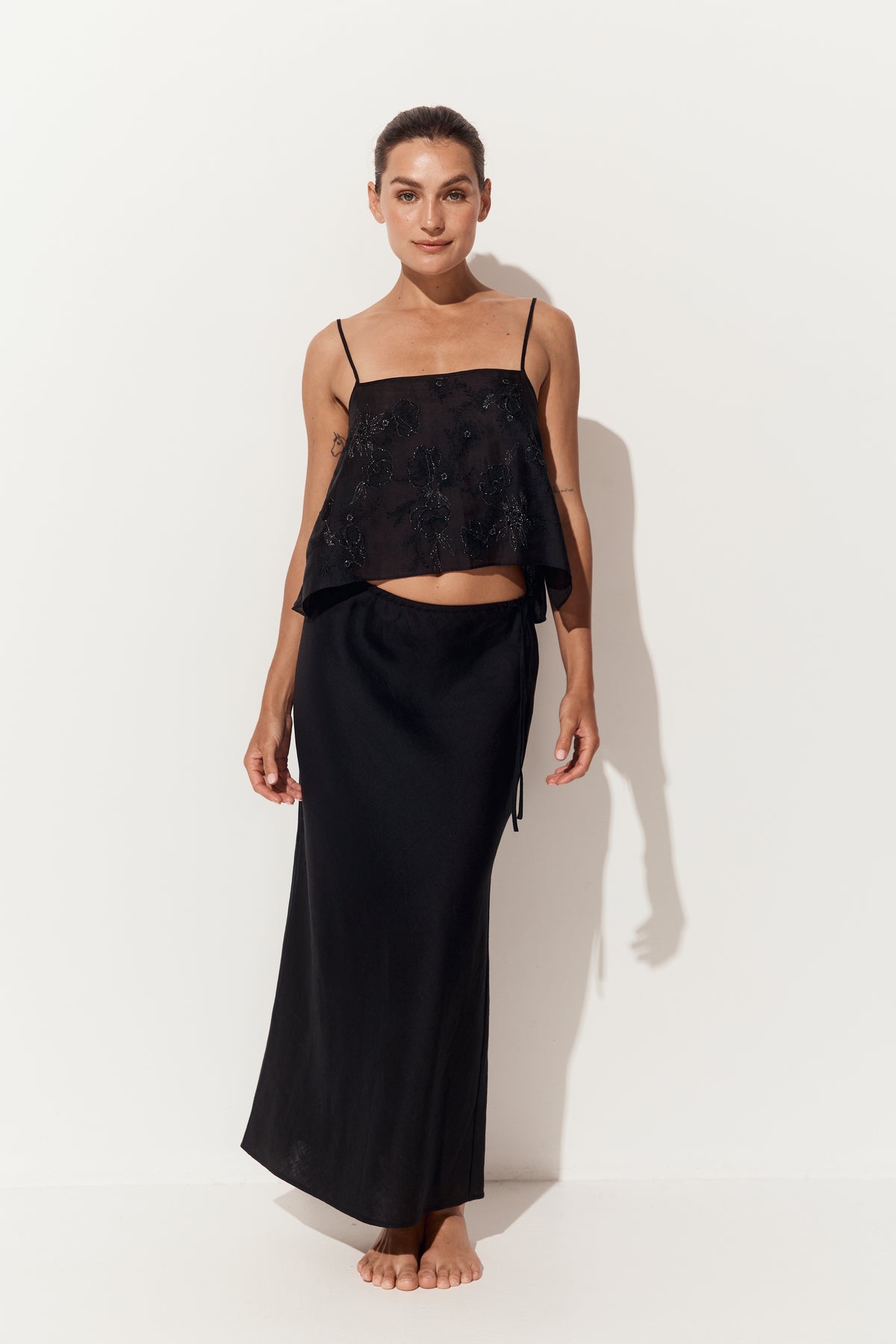 Flora Ramie Cami in Black - full length front view, cropped swing shape, styled with Riley Bias Linen Midi Skirt in Black, white studio - Lilly Pilly Collection