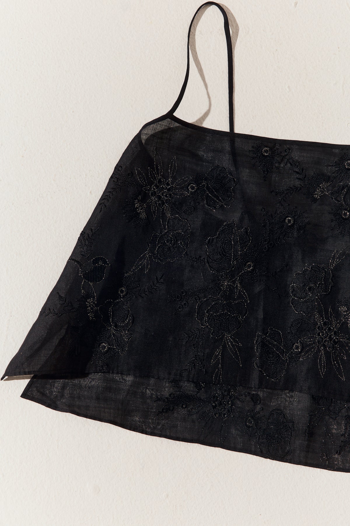 Flora Ramie Cami in Black - flat lay close-up of floral embroidery and strap - Lilly Pilly Collection