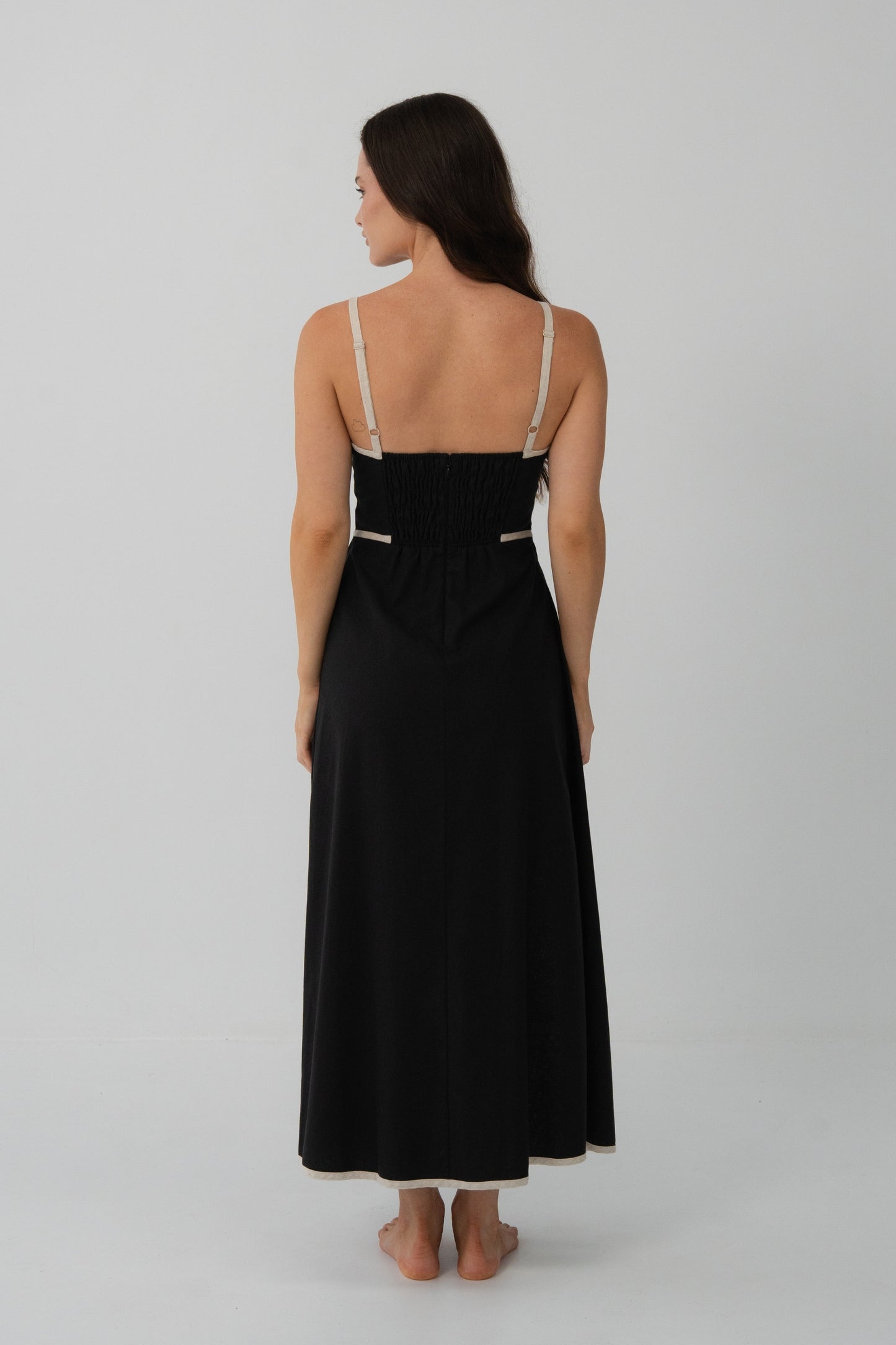 Back view of Hailey Linen midi dress in Black with oatmeal binding in studio - Lilly Pilly Collection