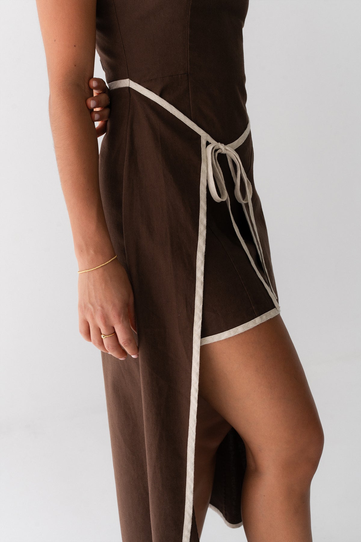 Close-up side view of Hailey Linen midi dress in Chocolate - Lilly Pilly Collection