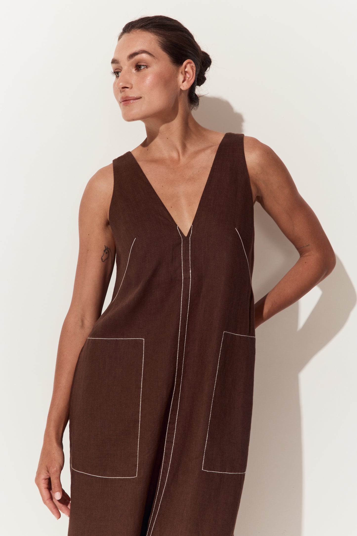 Iris Linen Midi Dress in Chocolate - close up view of dress with a deep V-neck, large front patch pockets - Lilly Pilly Collection