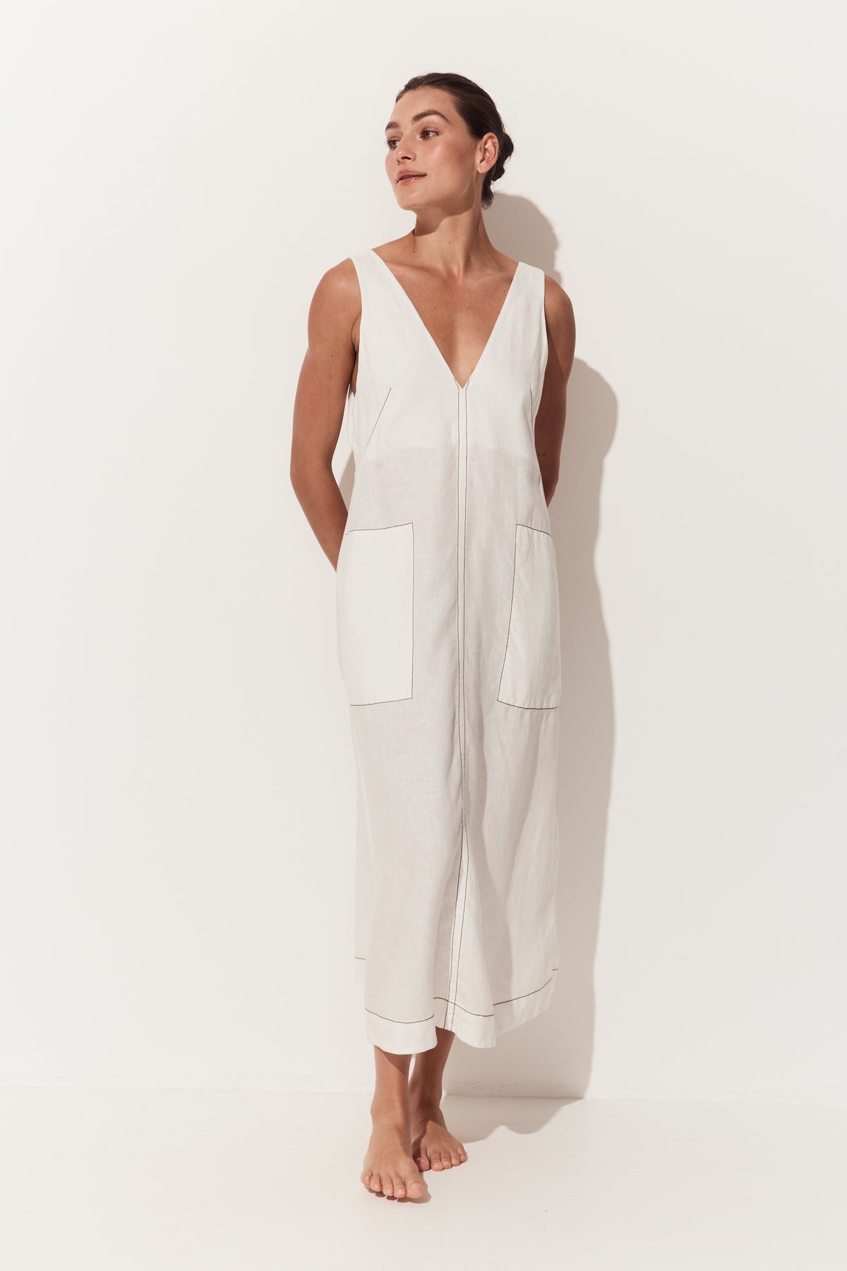 Iris Linen Midi Dress in Ivory and Chocolate - front view of ivory white linen midi with her arms by her side - Lilly Pilly Collection