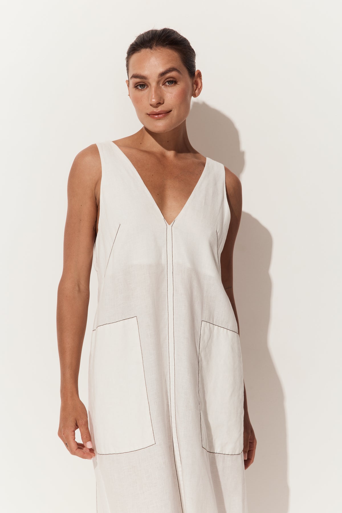 Iris Linen Midi Dress in Ivory and Chocolate - close up front view of ivory white linen midi dress with stitching - Lilly Pilly Collection