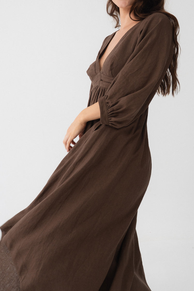Josie Linen Midi Dress in Chocolate - side view showing flowy midi length and puff sleeve movement - Lilly Pilly Collection