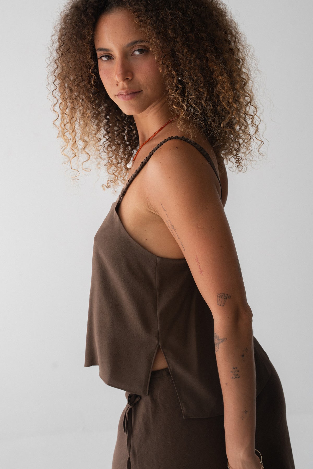 Leni Silk Cami in Chocolate - side view, open back and thin straps, worn with Riley Linen Skirt in Chocolate - Lilly Pilly Collection