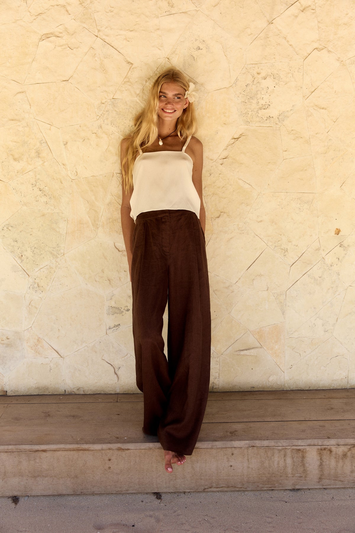 Leni Silk Cami in Ivory - full length, square neckline and thin straps, worn with Oli Pants in Chocolate, textured wall backdrop - Lilly Pilly Collection