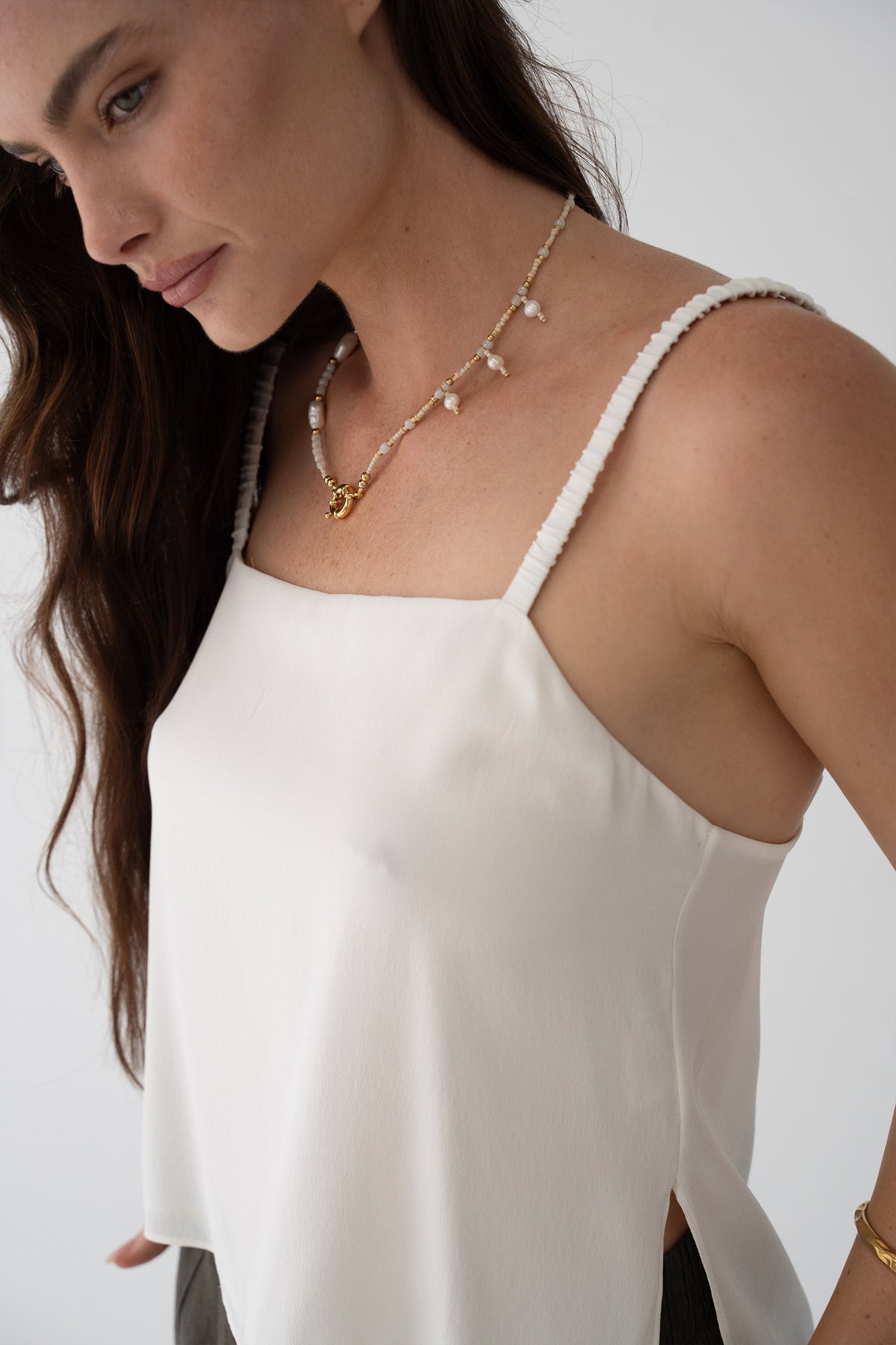 Leni Silk Cami in Ivory - close-up, square neckline and thin straps, layered pearl and gold necklace - Lilly Pilly Collection