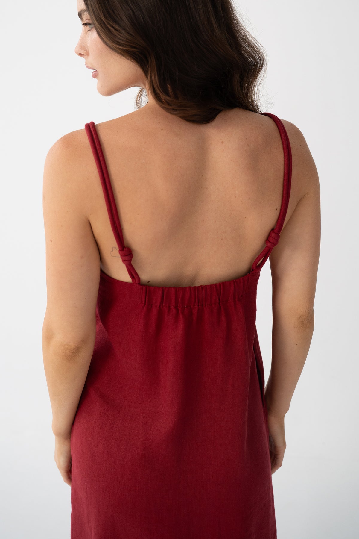 Lia Linen Midi Slip Dress in Cherry Red - back view, open back with knotted straps and gathered yoke - Lilly Pilly Collection