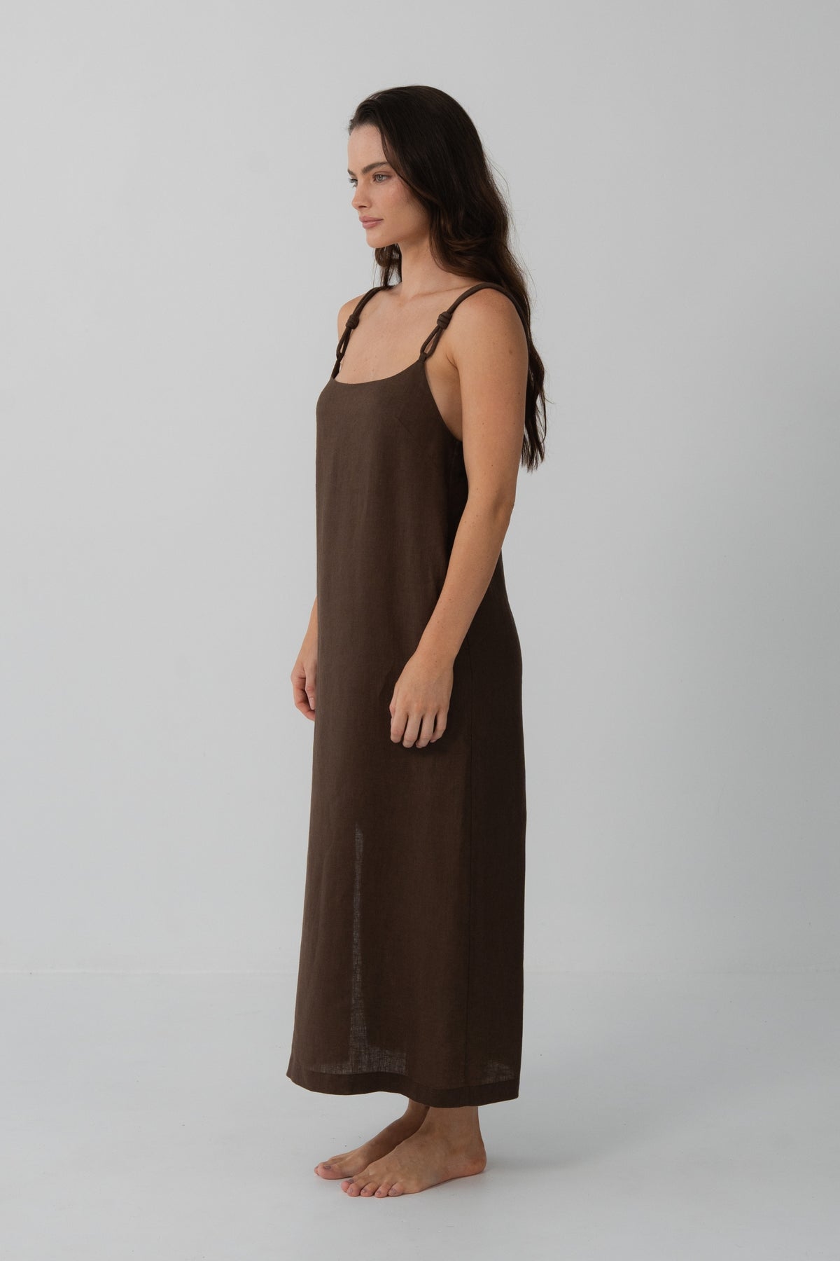 Lia Linen Midi Slip Dress in Chocolate - side profile, fluid midi length and braided straps - Lilly Pilly Collection