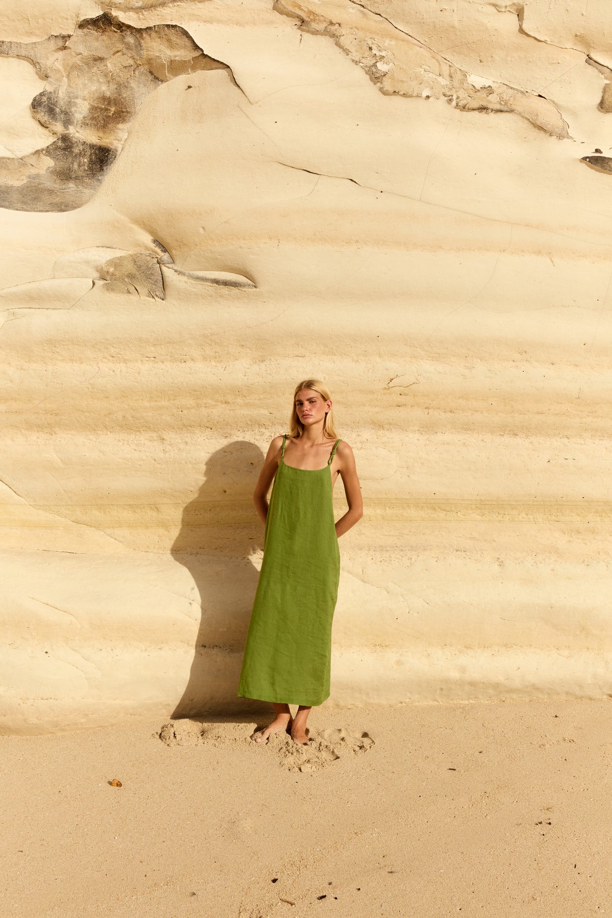 Lia Linen Midi Slip Dress in Lime Green - woman outdoors, full length view, braided straps and side split - Lilly Pilly Collection