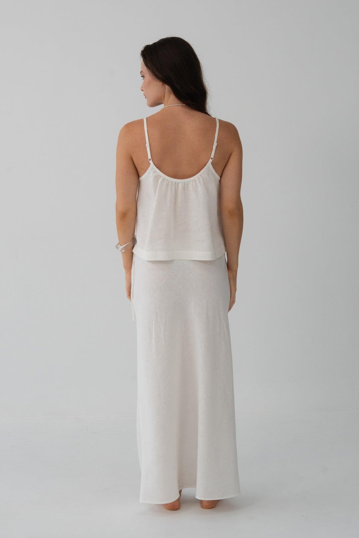 Lola Linen Cami in Ivory - back view, adjustable spaghetti straps and open back, styled with matching Riley Linen Maxi Skirt - Lilly Pilly Collection