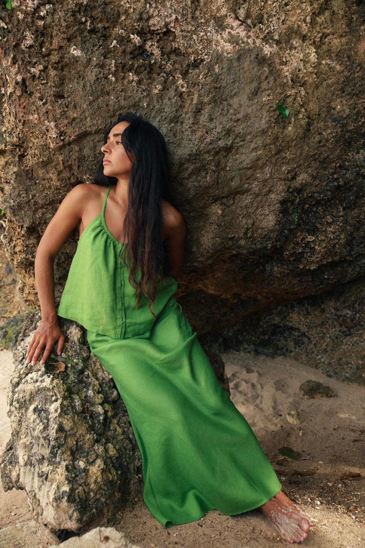 Lola Linen Cami in Lime Green - woman leaning on rock, gathered scoop neckline, styled with matching Riley Linen Maxi Skirt, sandstone backdrop - Lilly Pilly Collection