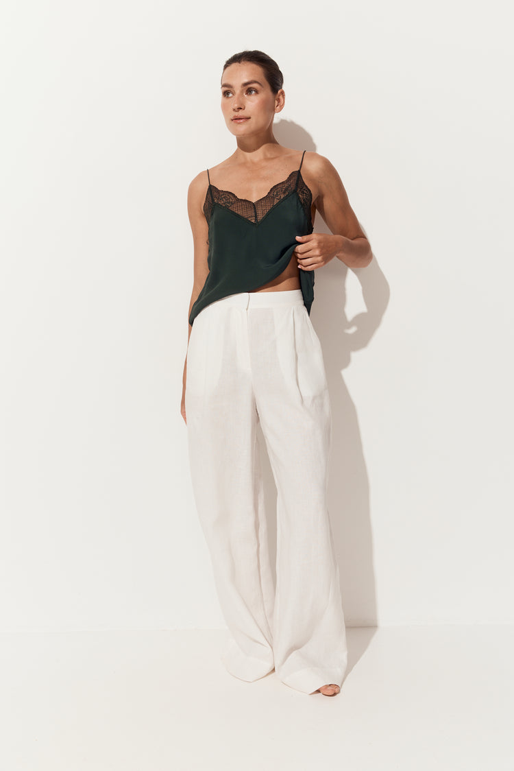 Oli Linen Pants in Ivory - front view, pleated wide-leg silhouette, white studio backdrop - Lilly Pilly Collection