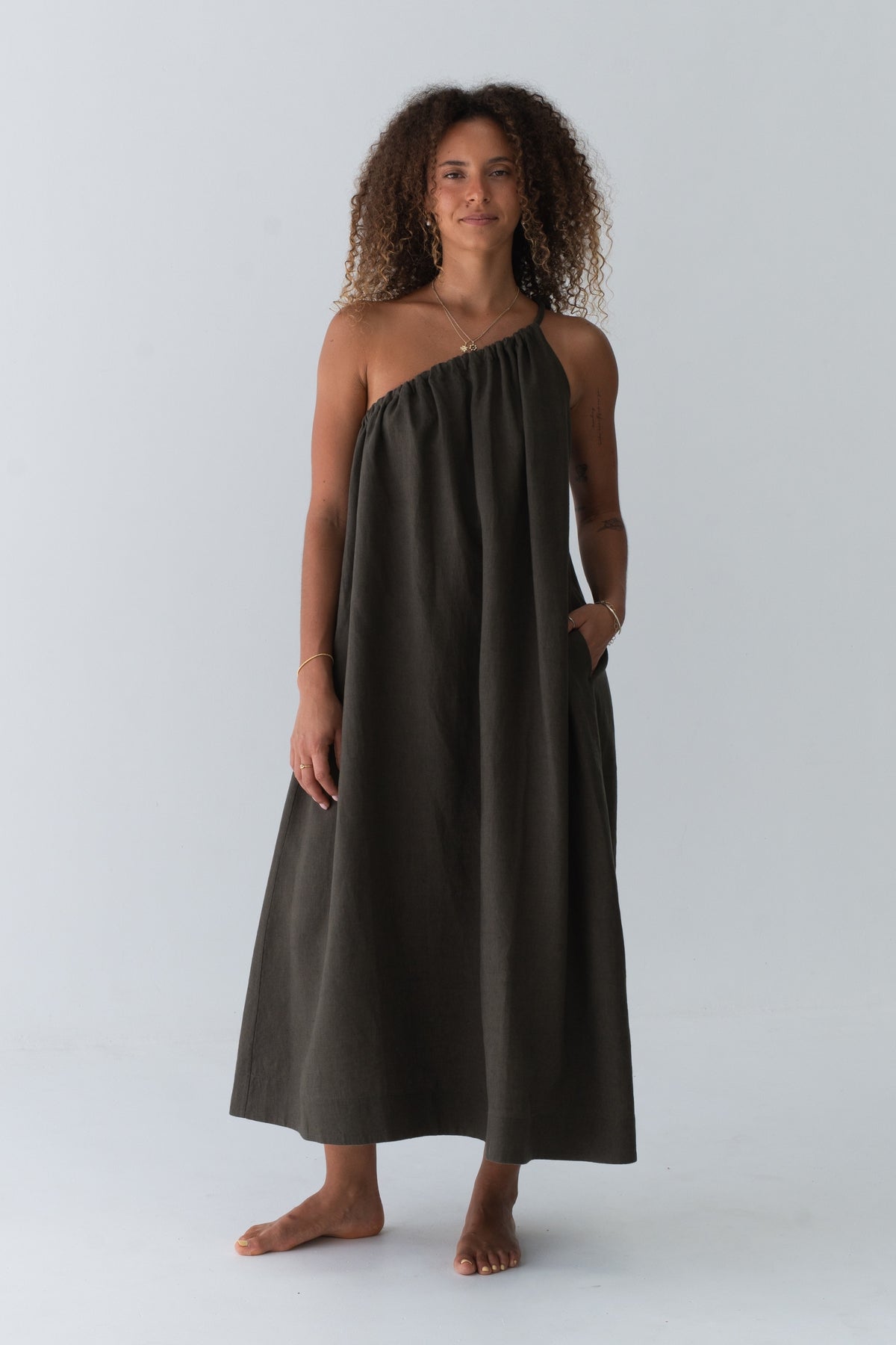 Ophelia Linen Midi Dress in Khaki - full front view, asymmetric gathered neckline and A-line midi silhouette - Lilly Pilly Collection
