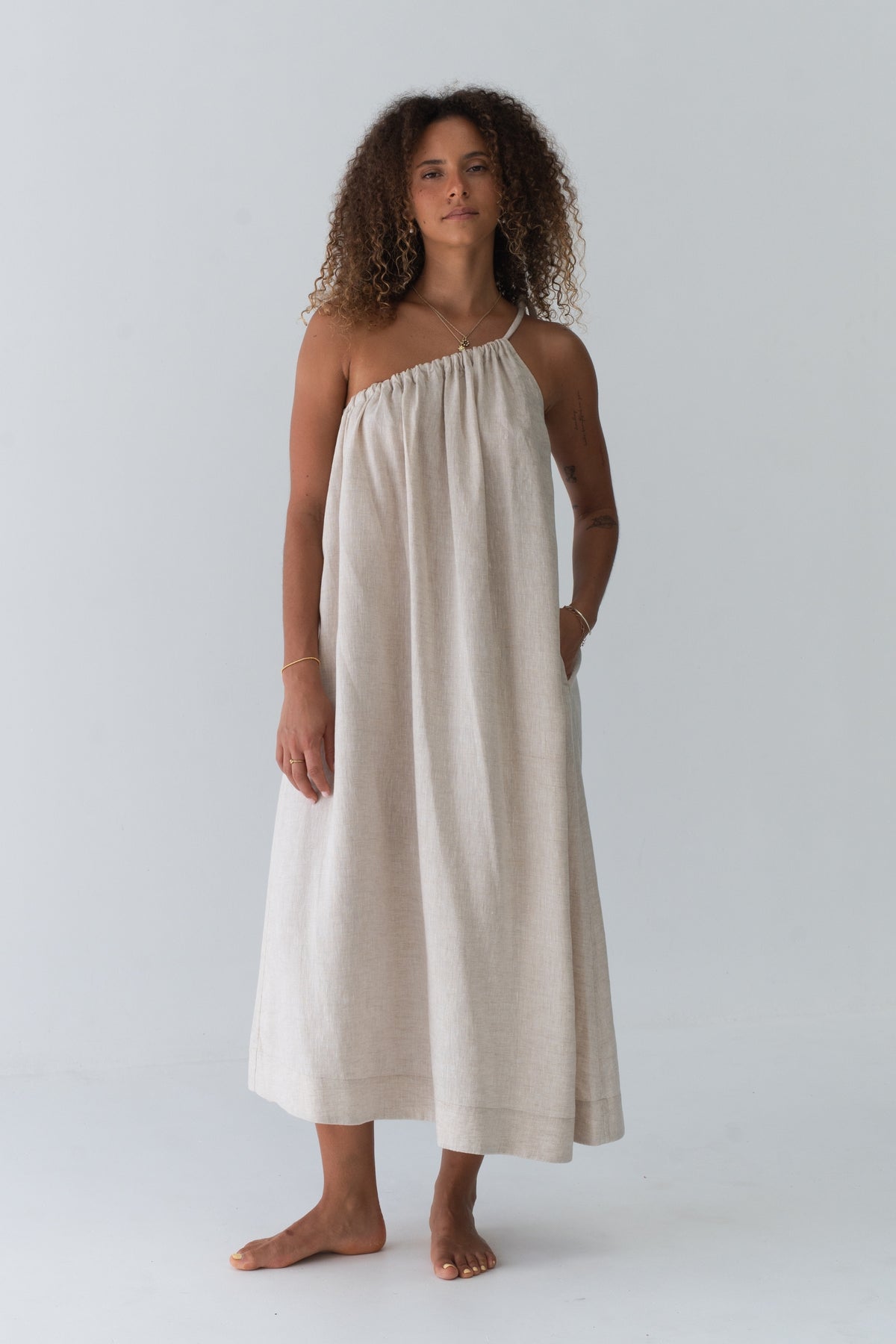 Ophelia Linen Midi Dress in Oatmeal - full front view, asymmetric gathered neckline and voluminous A-line midi - Lilly Pilly Collection