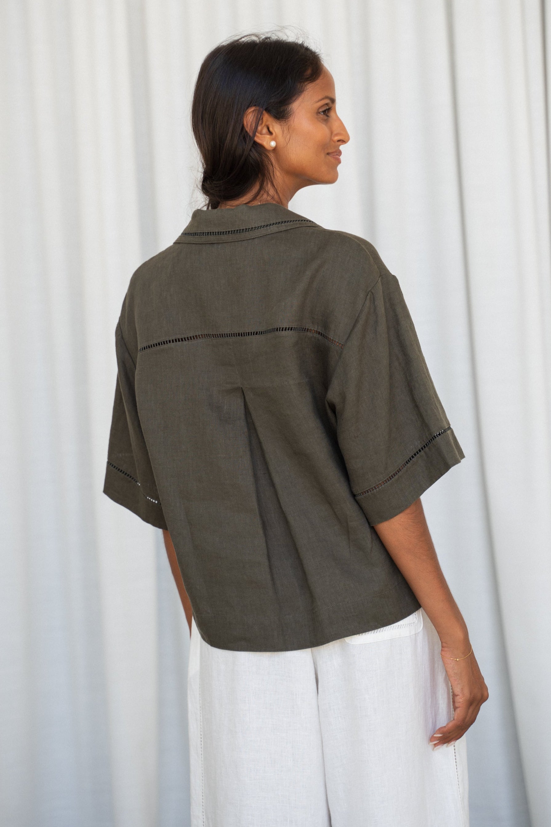 LILLY PILLY woman wearing a Pixie linen shirt in khaki back view