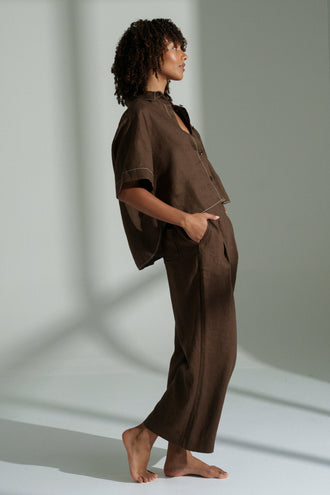 Rika Linen Pants in Chocolate - side view paired with matching Nika linen shirt top in a white studio - Lilly Pilly Collection