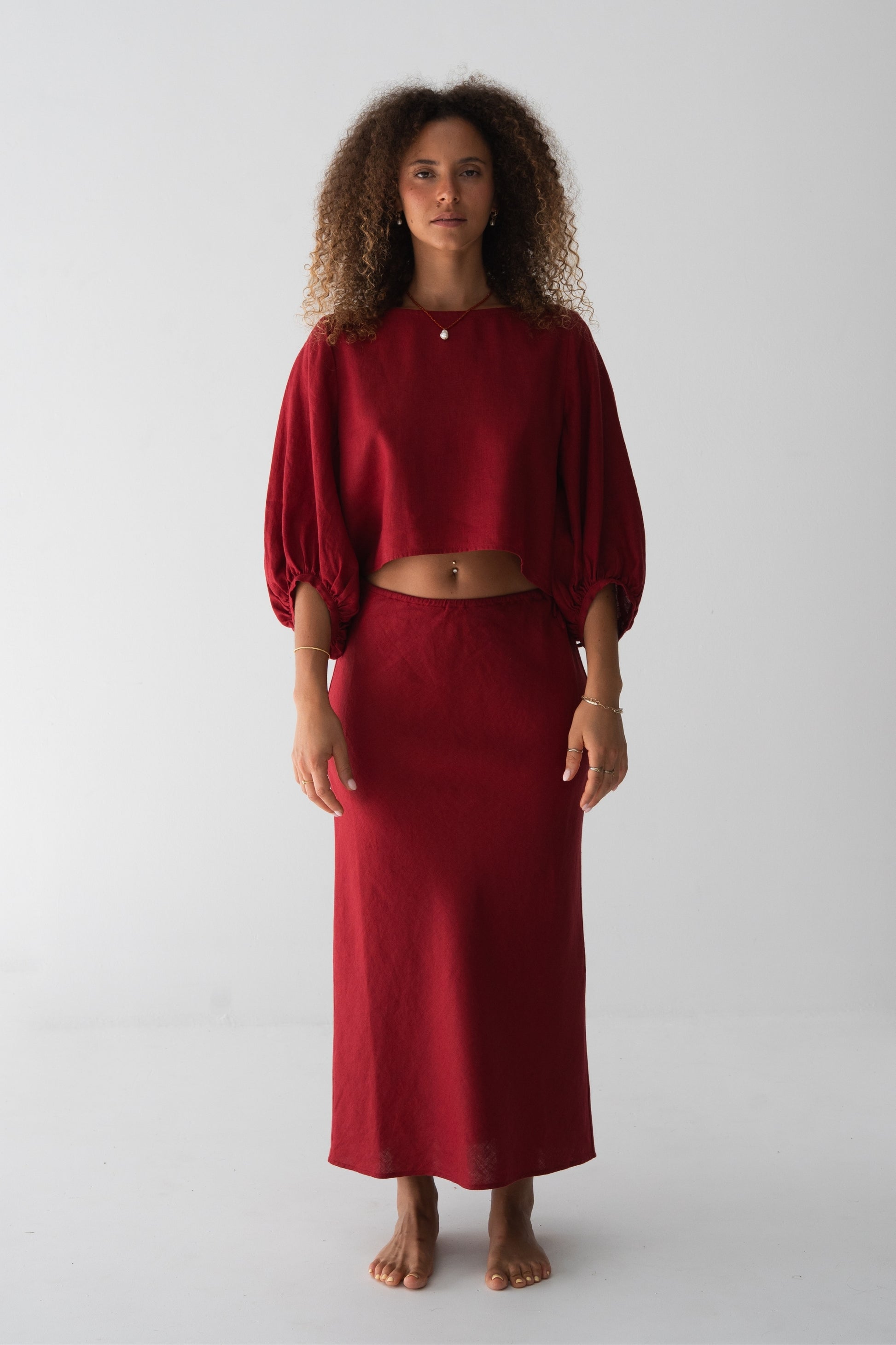 Riley Bias Linen Midi Skirt in Cherry Red - full length front view, woman wearing Cherry Red linen skirt with matching linen balloon-sleeve Demi top - Lilly Pilly Collection