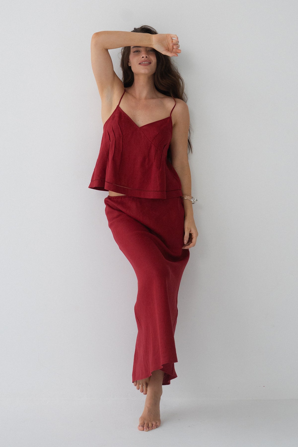 Riley Bias Linen Midi Skirt in Cherry Red - full length front view, woman wearing Cherry Red linen skirt with matching Leni cami, studio setting - Lilly Pilly Collection