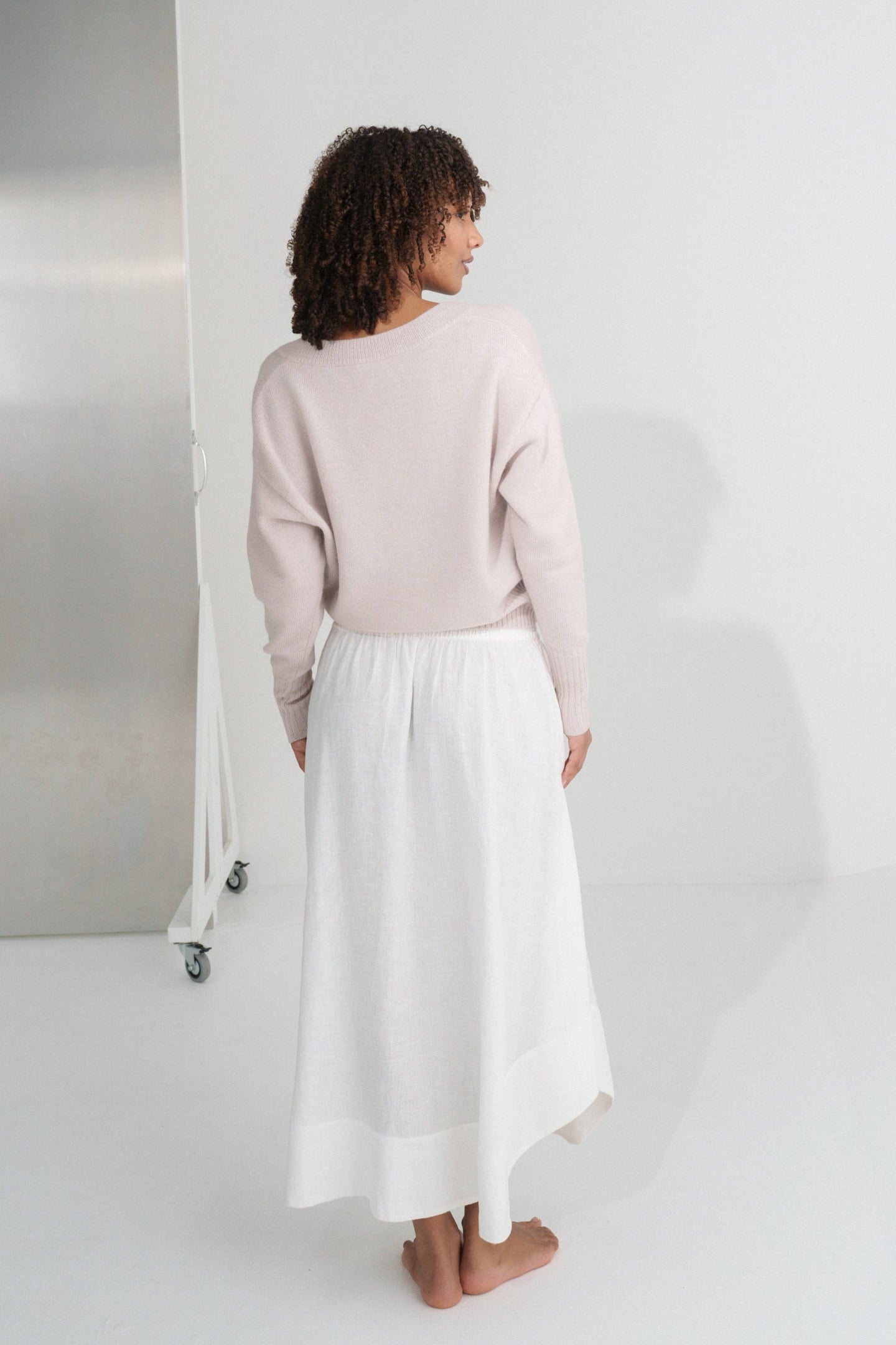 LILLY PILLY Taylor merino wool knit cardi in Lilac and ivory Hannah skirt showing back view