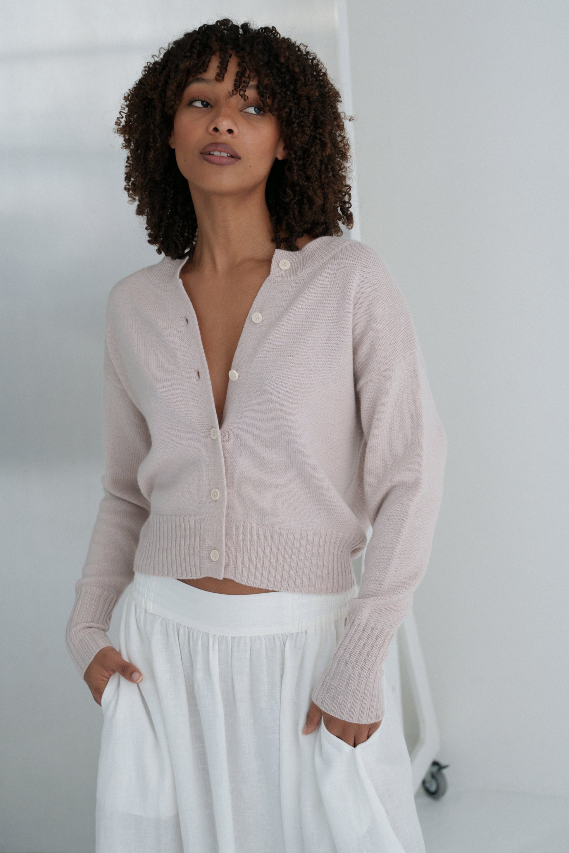 LILLY PILLY Taylor merino wool knit cardi in Lilac and white background