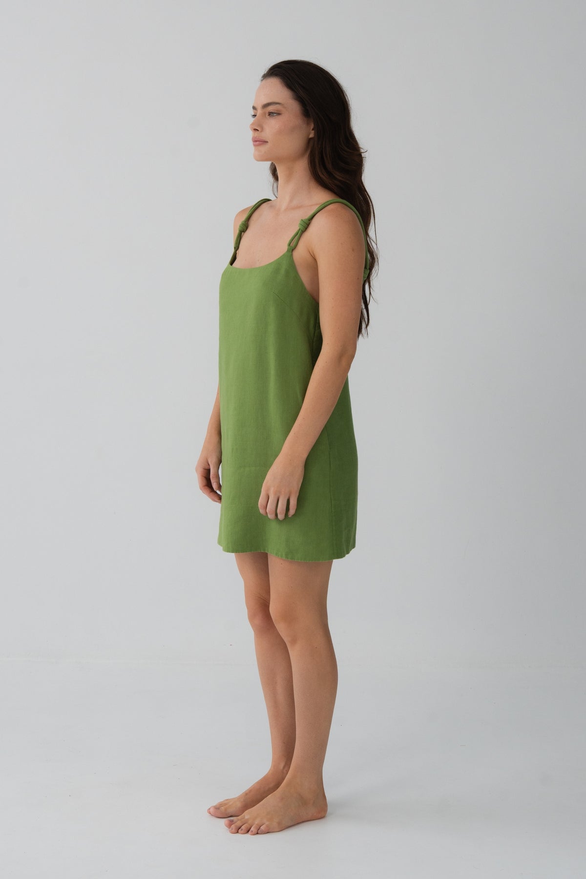 Tevi Linen Short Slip Dress in Lime Green - side profile, braided straps and short hem - Lilly Pilly Collection