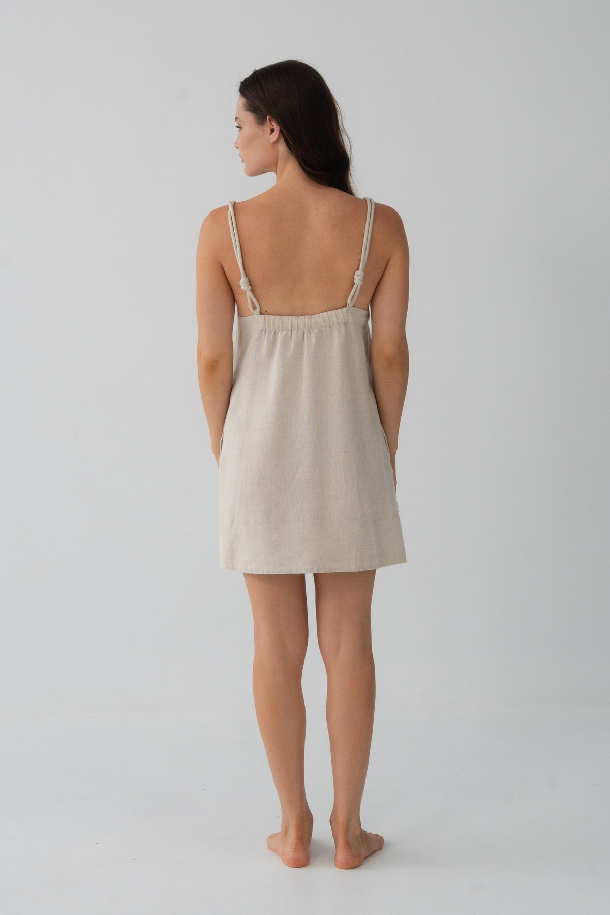 Tevi Linen Short Slip Dress in Oatmeal - back view, gathered yoke and braided straps - Lilly Pilly Collection