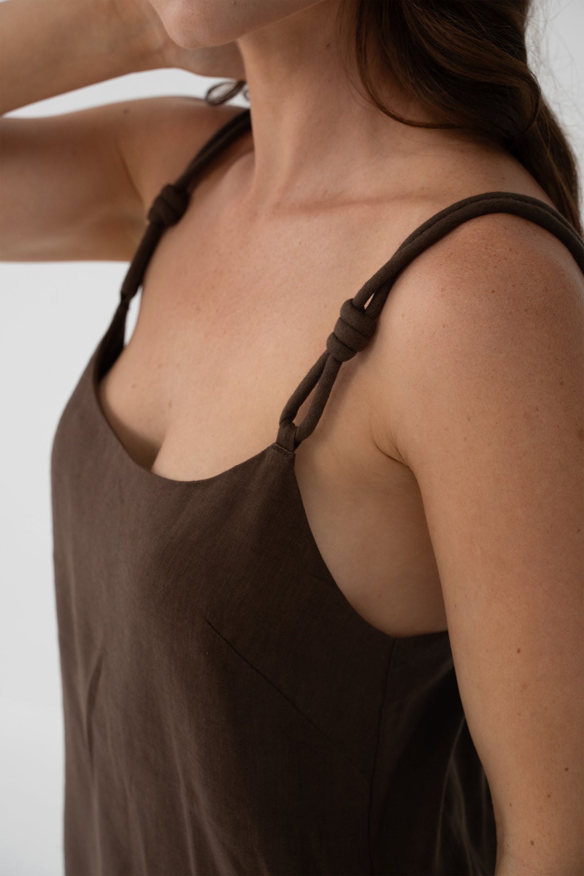 Tevi Linen Short Slip Dress in Chocolate - close-up of braided strap and knot detail - Lilly Pilly Collection