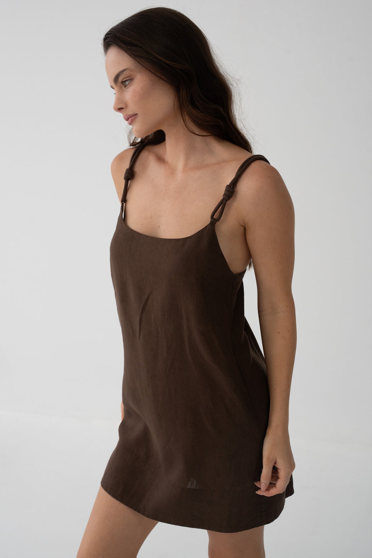 Tevi Linen Short Slip Dress in Chocolate - side profile, scoop neckline and short linen silhouette - Lilly Pilly Collection